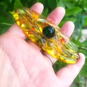 vintage apple juice reversed carved bakelite brooch